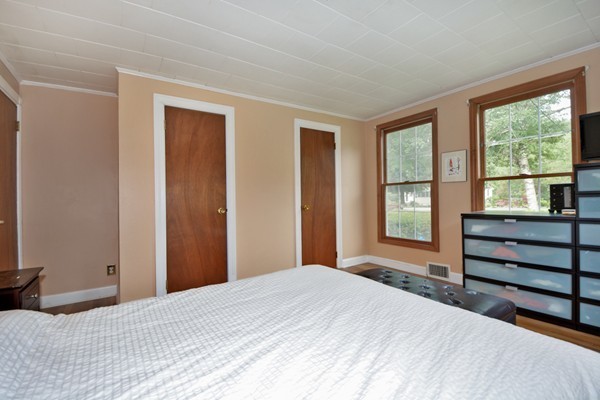253 West Acton Road Stow, MA 01775 - Photo 12 of 21 a bedroom with a bed and a window