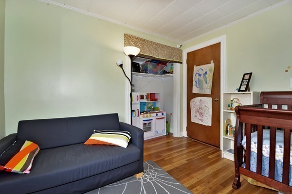 253 West Acton Road Stow, MA 01775 - Photo 16 of 21 a living room with furniture and a flat screen tv