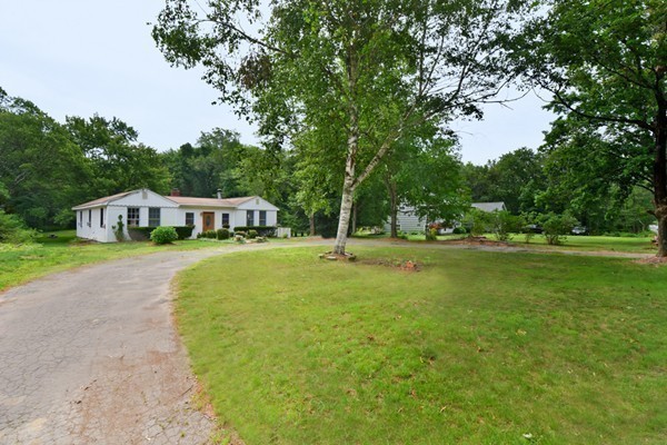 253 West Acton Road Stow, MA 01775 - Photo 21 of 21 a house view with a garden space