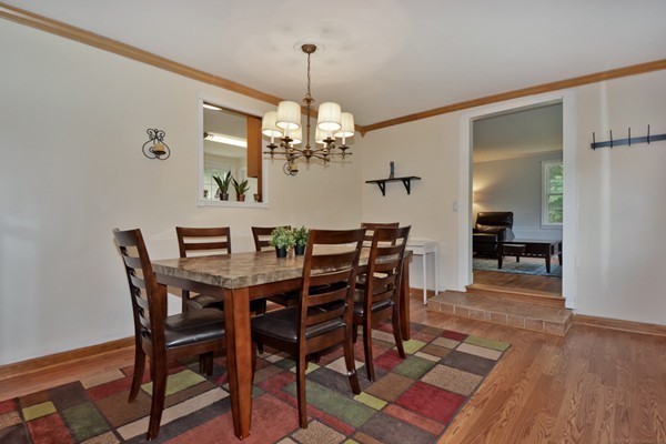 253 West Acton Road Stow, MA 01775 - Photo 5 of 21 a view of a dining room with furniture and wooden floor