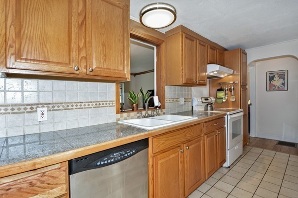 253 West Acton Road Stow, MA 01775 - Photo 7 of 21 a kitchen with cabinets and window