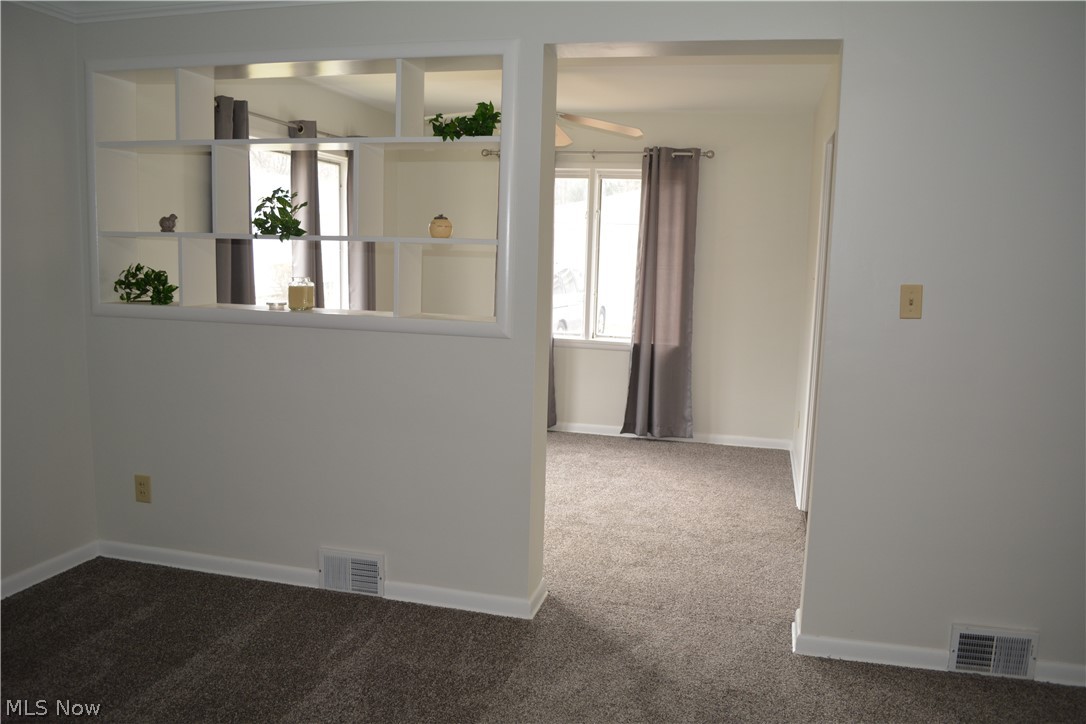 5674 Myers Road New Franklin, OH 44319 - Photo 11 of 26 Standing in the living room looking into dining room.