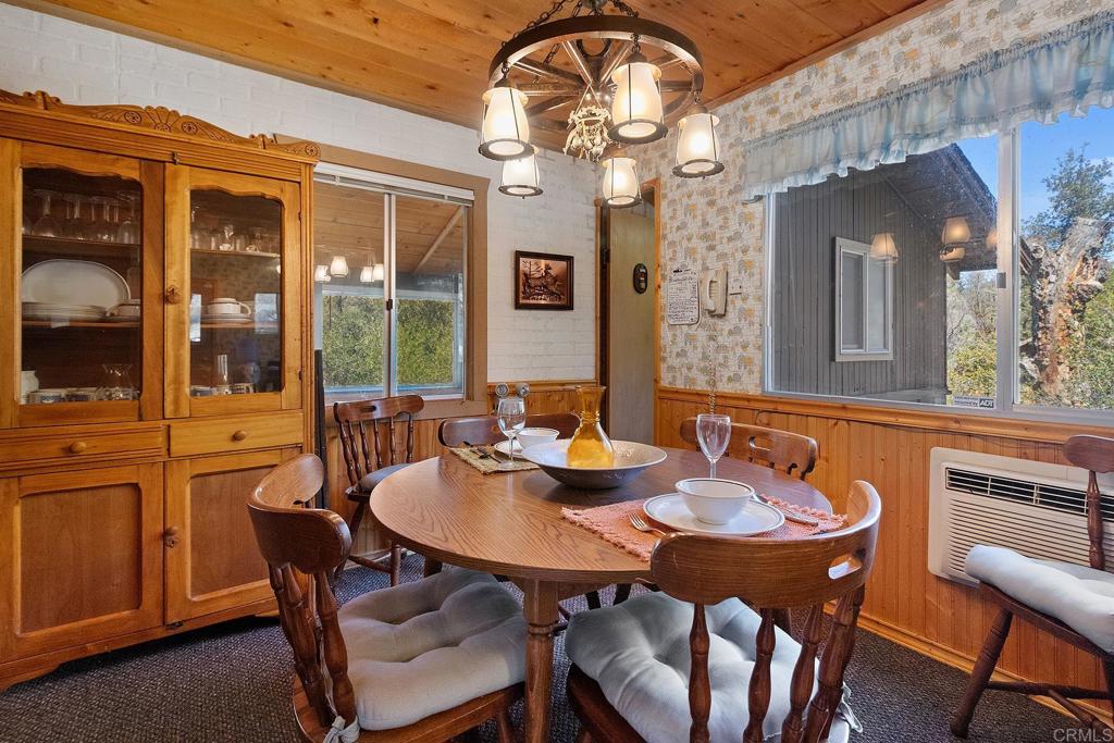 9150- Pine Creek Road, Unit 39 Pine Valley, CA 91962 - Photo 12 of 27 a view of a dining room with furniture window and outside view