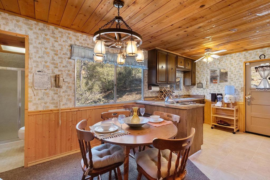 9150- Pine Creek Road, Unit 39 Pine Valley, CA 91962 - Photo 14 of 27 a view of a dining room with furniture window and outside view