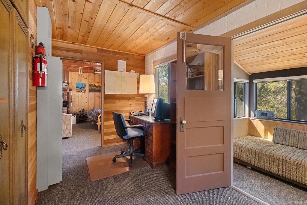 9150- Pine Creek Road, Unit 39 Pine Valley, CA 91962 - Photo 20 of 27 a living room with furniture a flat screen tv and a window