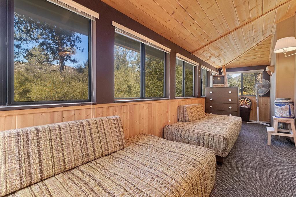 9150- Pine Creek Road, Unit 39 Pine Valley, CA 91962 - Photo 22 of 27 a bedroom with double bed and a large window