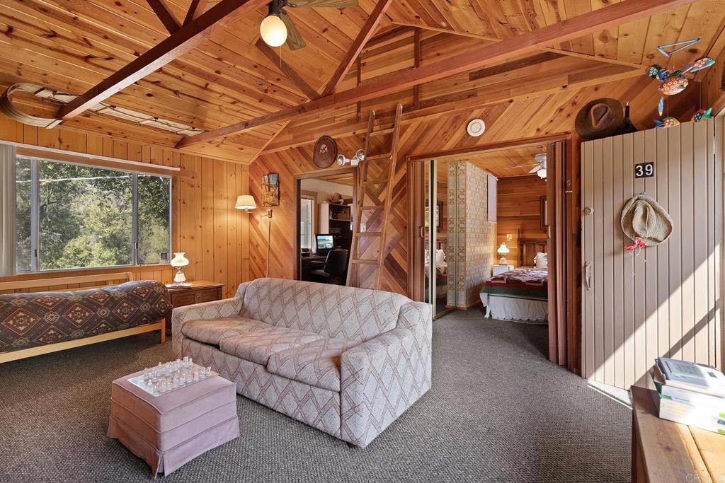 9150- Pine Creek Road, Unit 39 Pine Valley, CA 91962 - Photo 6 of 27 a living room with furniture and a window