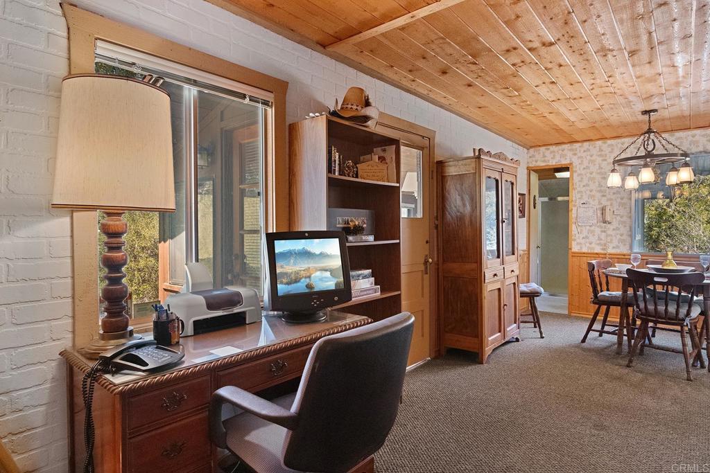 9150- Pine Creek Road, Unit 39 Pine Valley, CA 91962 - Photo 10 of 27 a room with furniture and a window