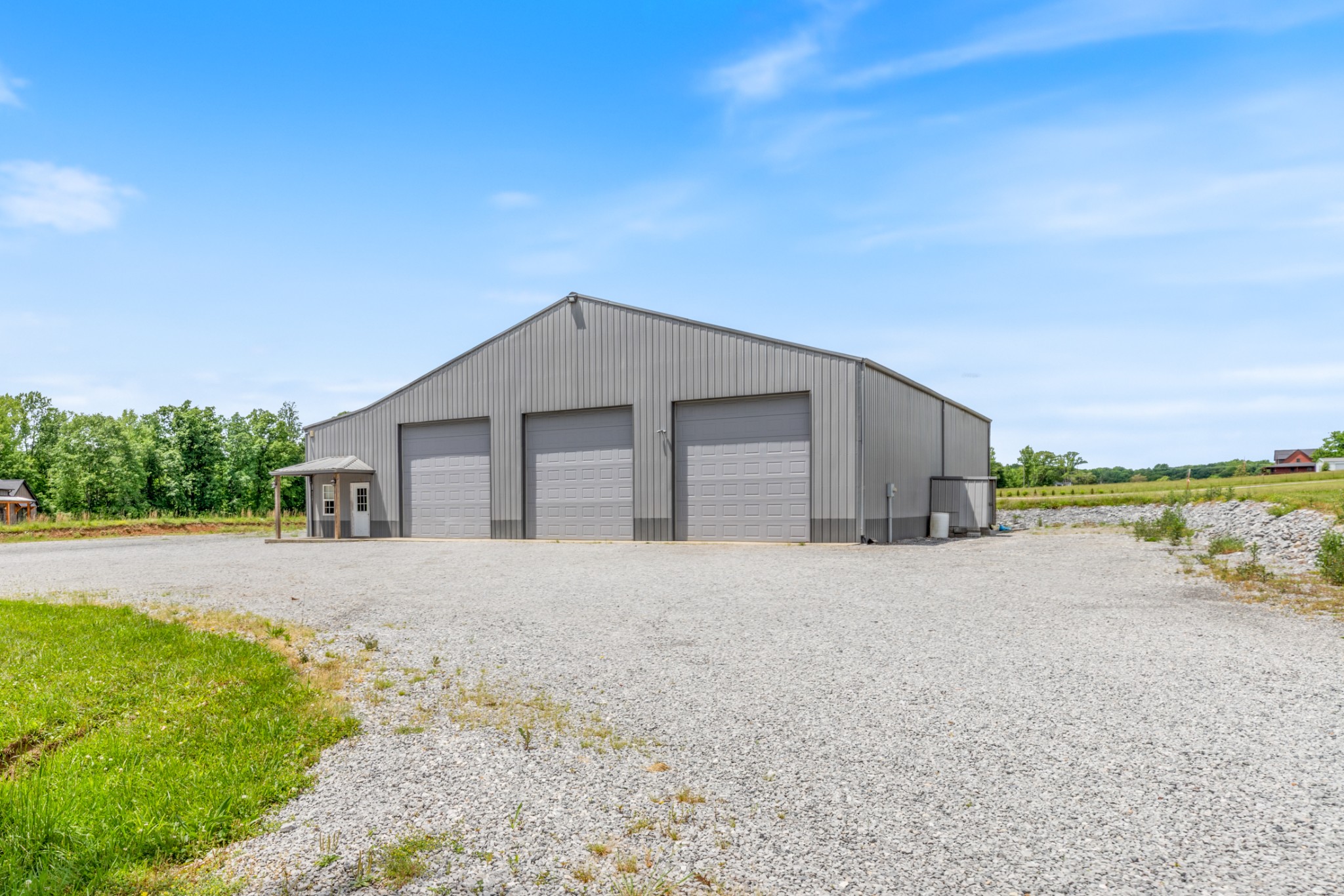 3791 Sylvia Road Dickson, TN 37055 - Photo 72 of 96 a house with a yard and a large parking space