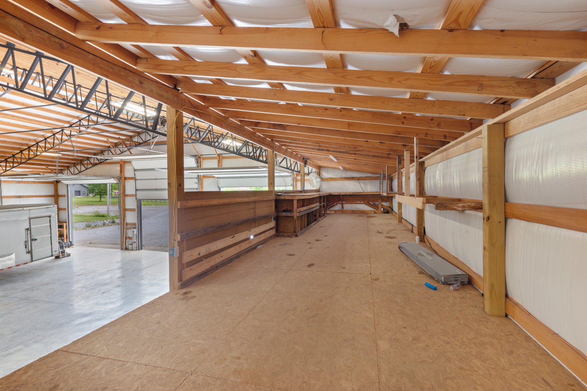 3791 Sylvia Road Dickson, TN 37055 - Photo 76 of 96 a view of an empty room with wooden floor