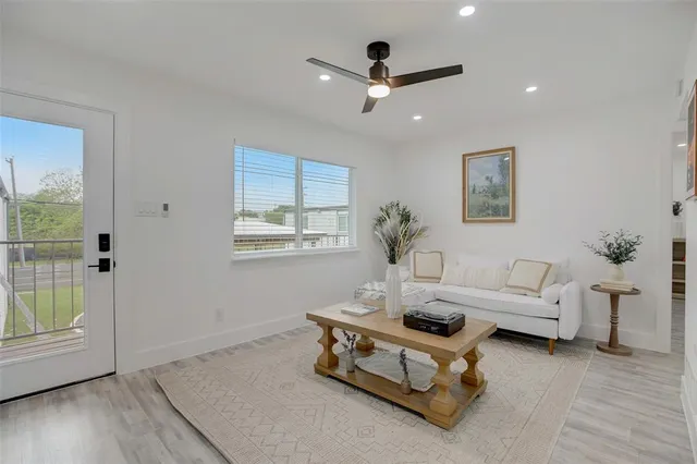 a living room with furniture and a window