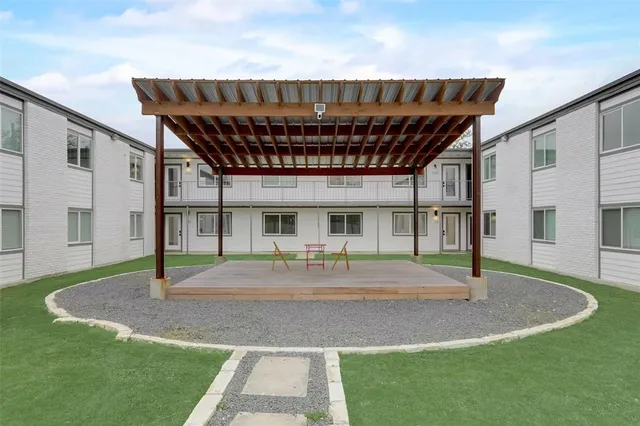 a view of yard with patio