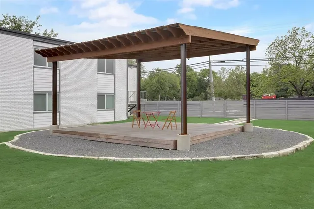 a kitchen with appliances cabinets and a sink