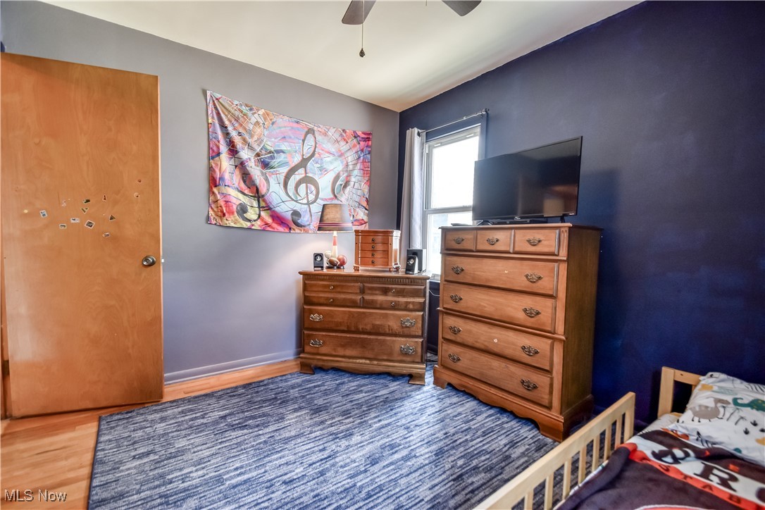 357 Clarmont Road Willowick, OH 44095 - Photo 10 of 27 Bedroom with wood finished floors and ceiling fan