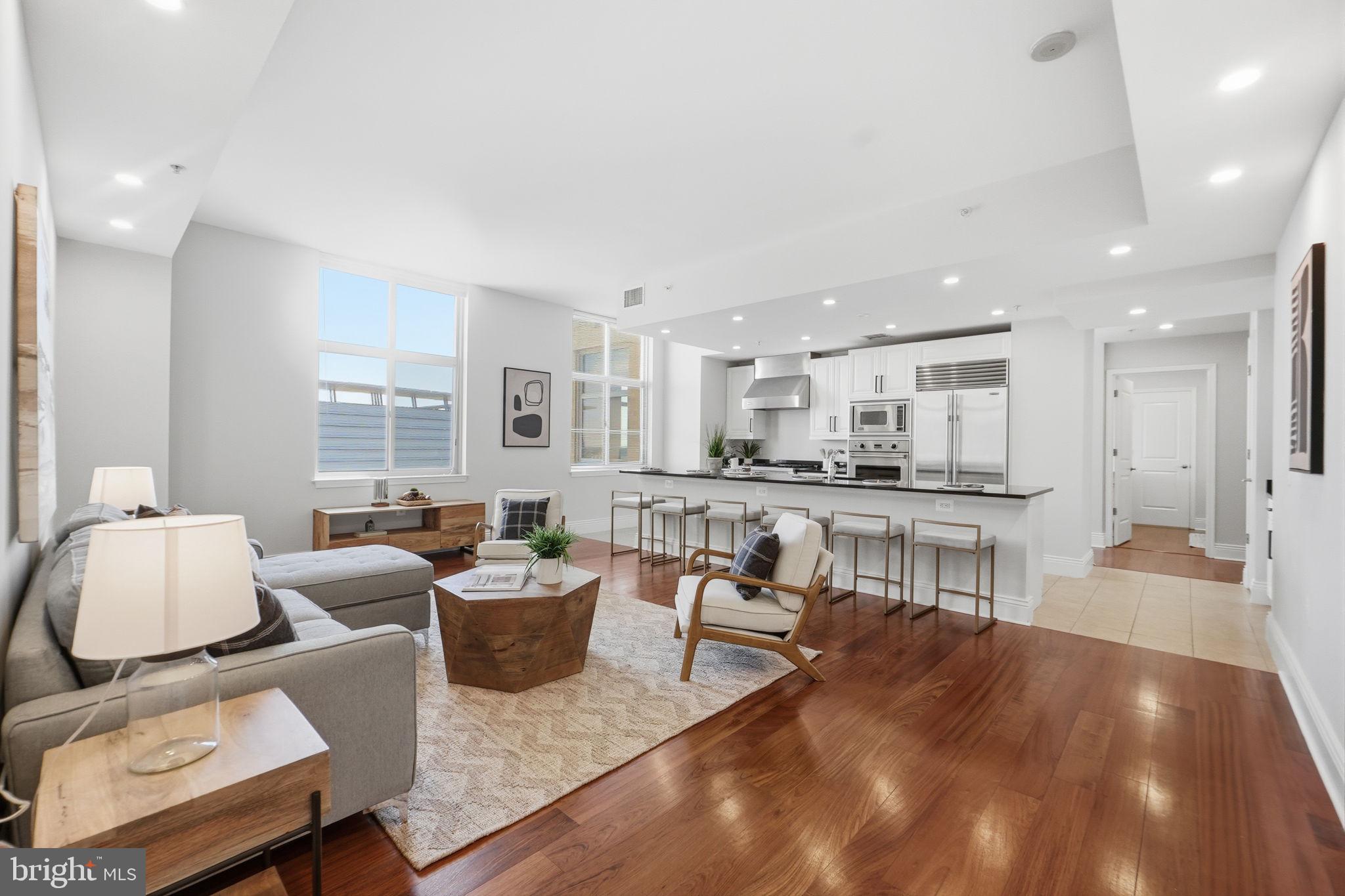 11990 Market Street, Unit 2103 Reston, VA 20190 - Photo 4 of 78 Spacious modern living area with light.