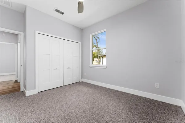 an empty room with windows