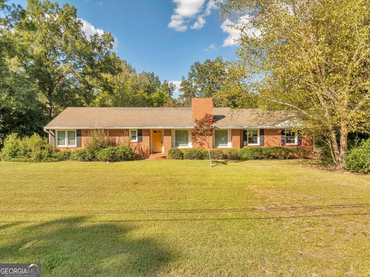 1805 Kings Chapel Road Perry, GA 31069 - Photo 1 of 1 a front view of house with ocean view