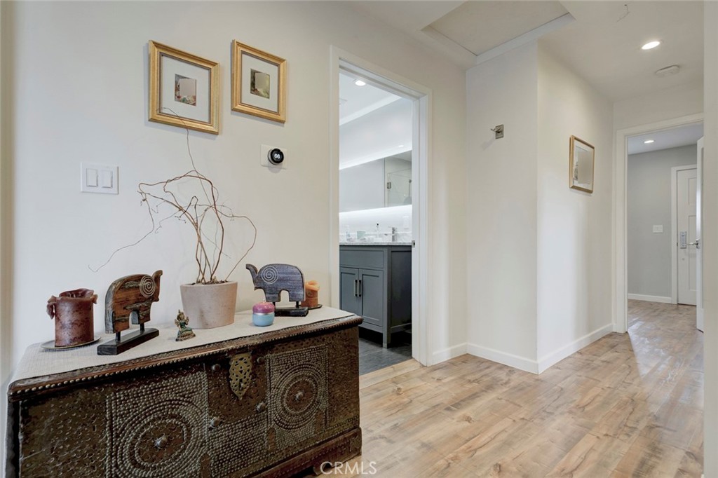 6911 Valmont Street Tujunga, CA 91042 - Photo 11 of 55 a kitchen with stainless steel appliances granite countertop a sink and a stove