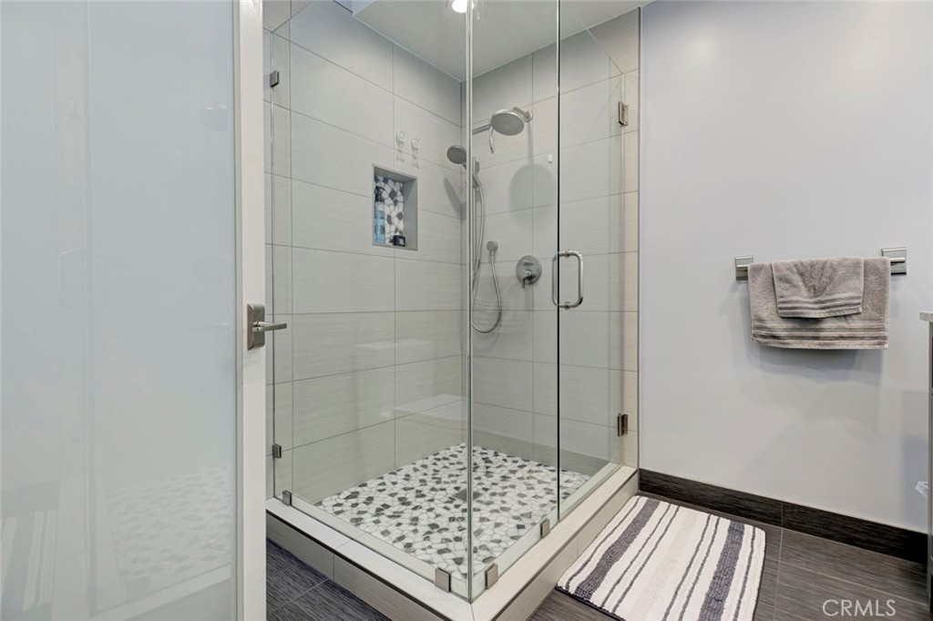 6911 Valmont Street Tujunga, CA 91042 - Photo 14 of 55 a bathroom with a shower