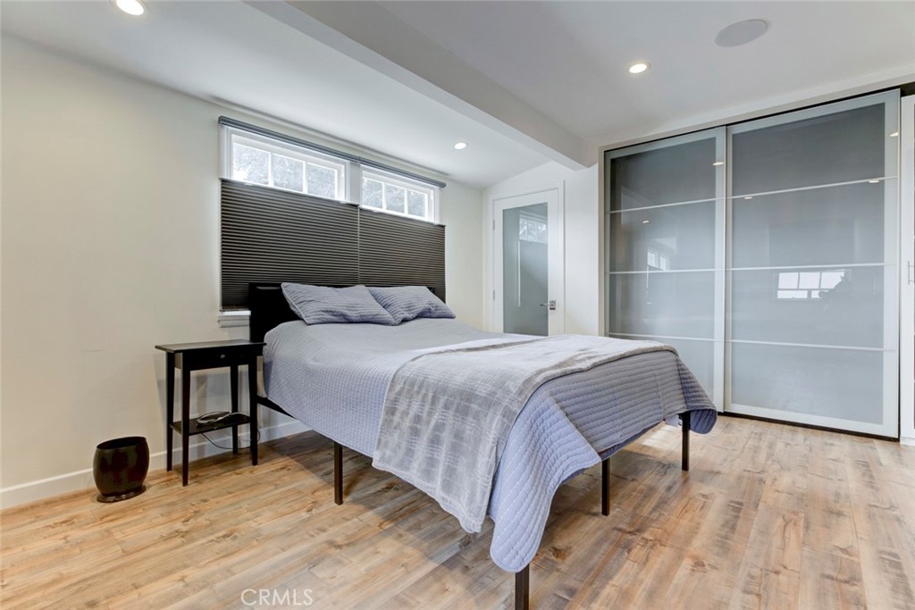 6911 Valmont Street Tujunga, CA 91042 - Photo 17 of 55 a bedroom with a bed and a table