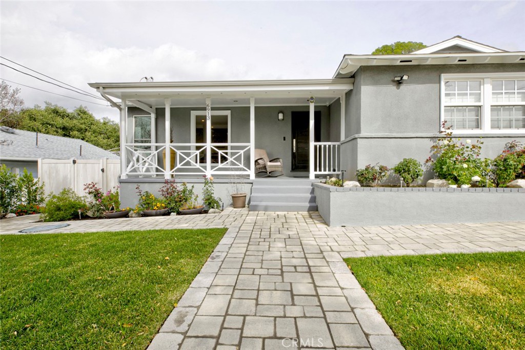 6911 Valmont Street Tujunga, CA 91042 - Photo 2 of 55 a front view of house with yard