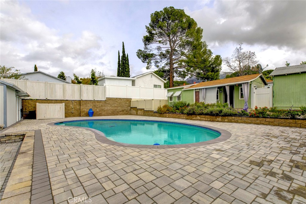 6911 Valmont Street Tujunga, CA 91042 - Photo 34 of 55 a view of a house with backyard and sitting area