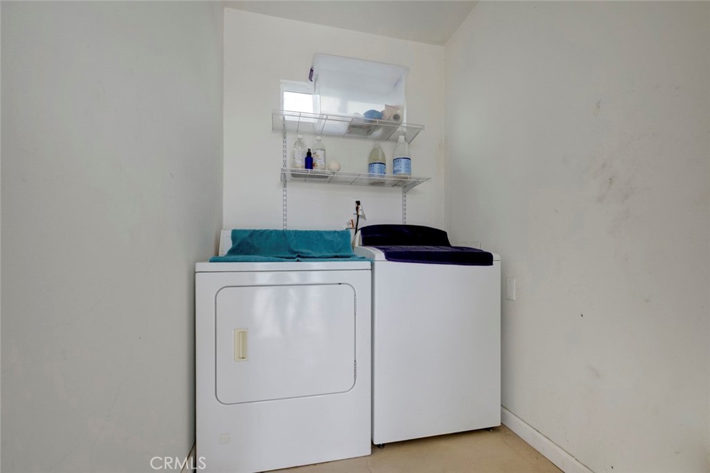 6911 Valmont Street Tujunga, CA 91042 - Photo 39 of 55 a utility room with dryer and washer
