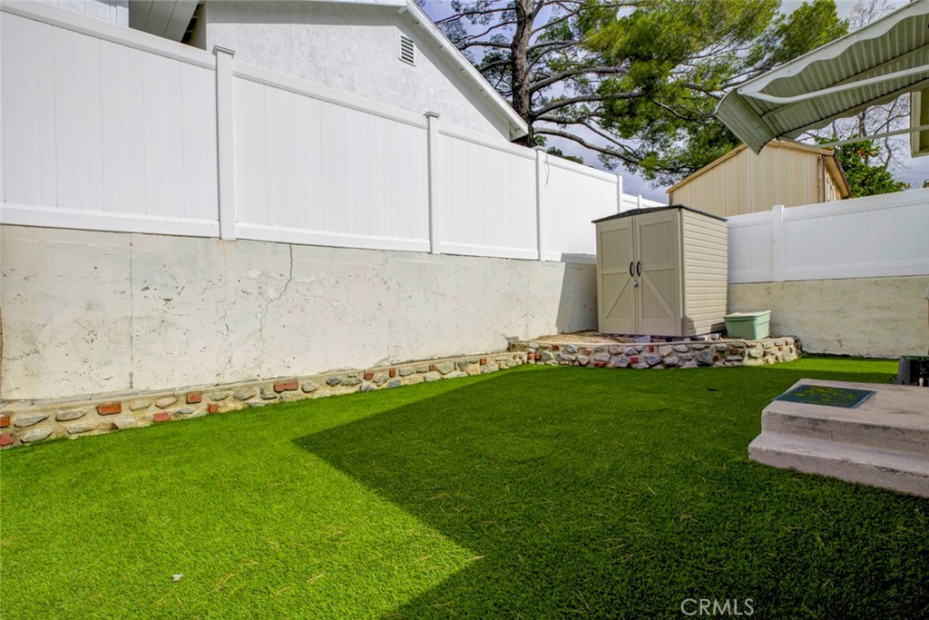 6911 Valmont Street Tujunga, CA 91042 - Photo 49 of 55 a view of a back yard of the house