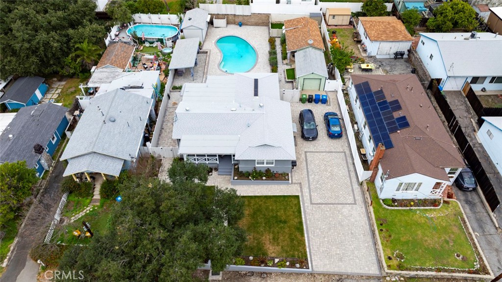 6911 Valmont Street Tujunga, CA 91042 - Photo 52 of 55 an aerial view of residential houses with outdoor space and parking