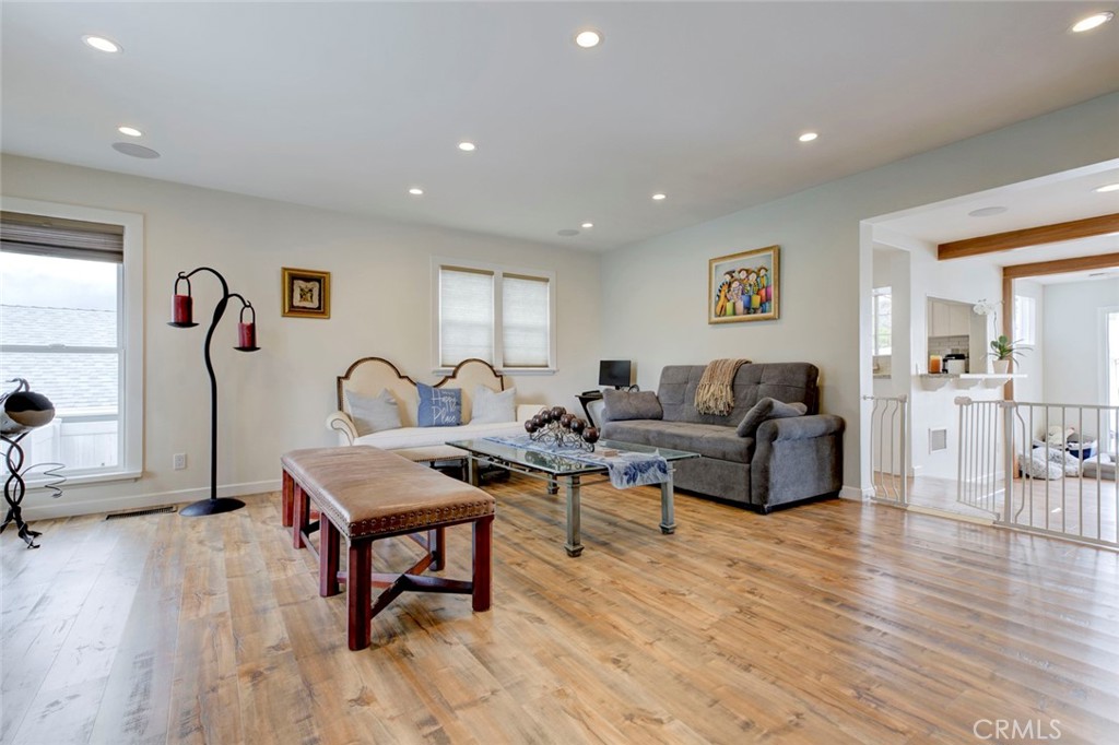 6911 Valmont Street Tujunga, CA 91042 - Photo 9 of 55 a living room with furniture a rug and a table