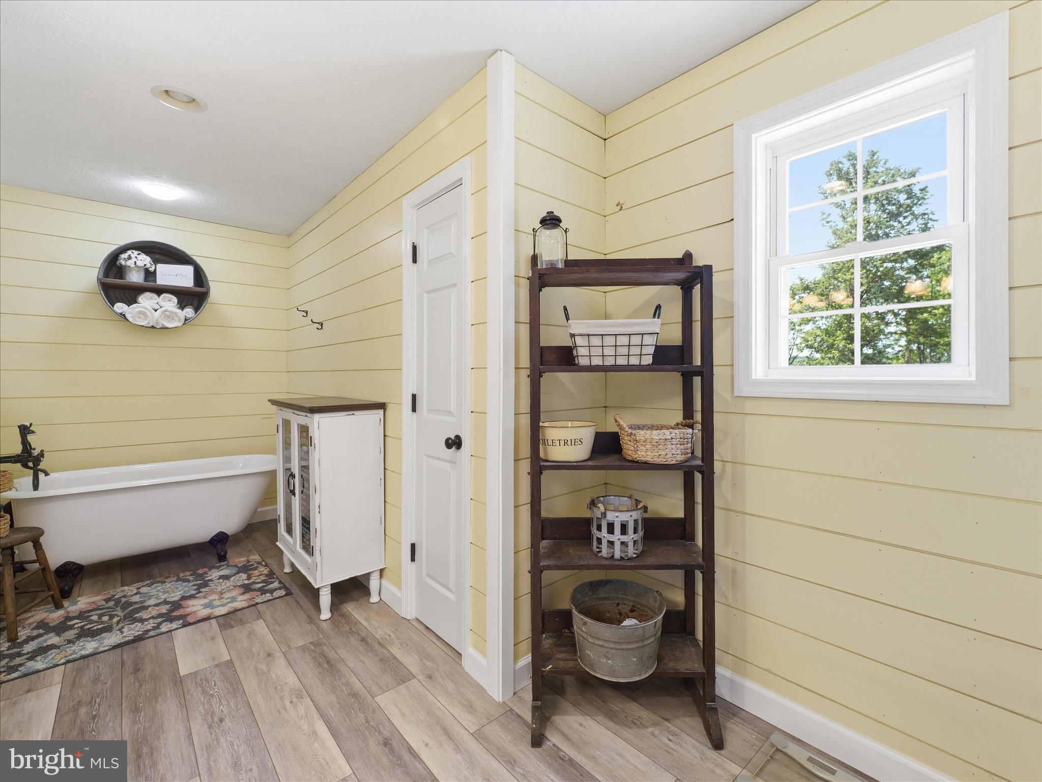 726 Doe Run Road Inwood, WV 25428 - Photo 49 of 68 a bathroom with a bathtub and a shower