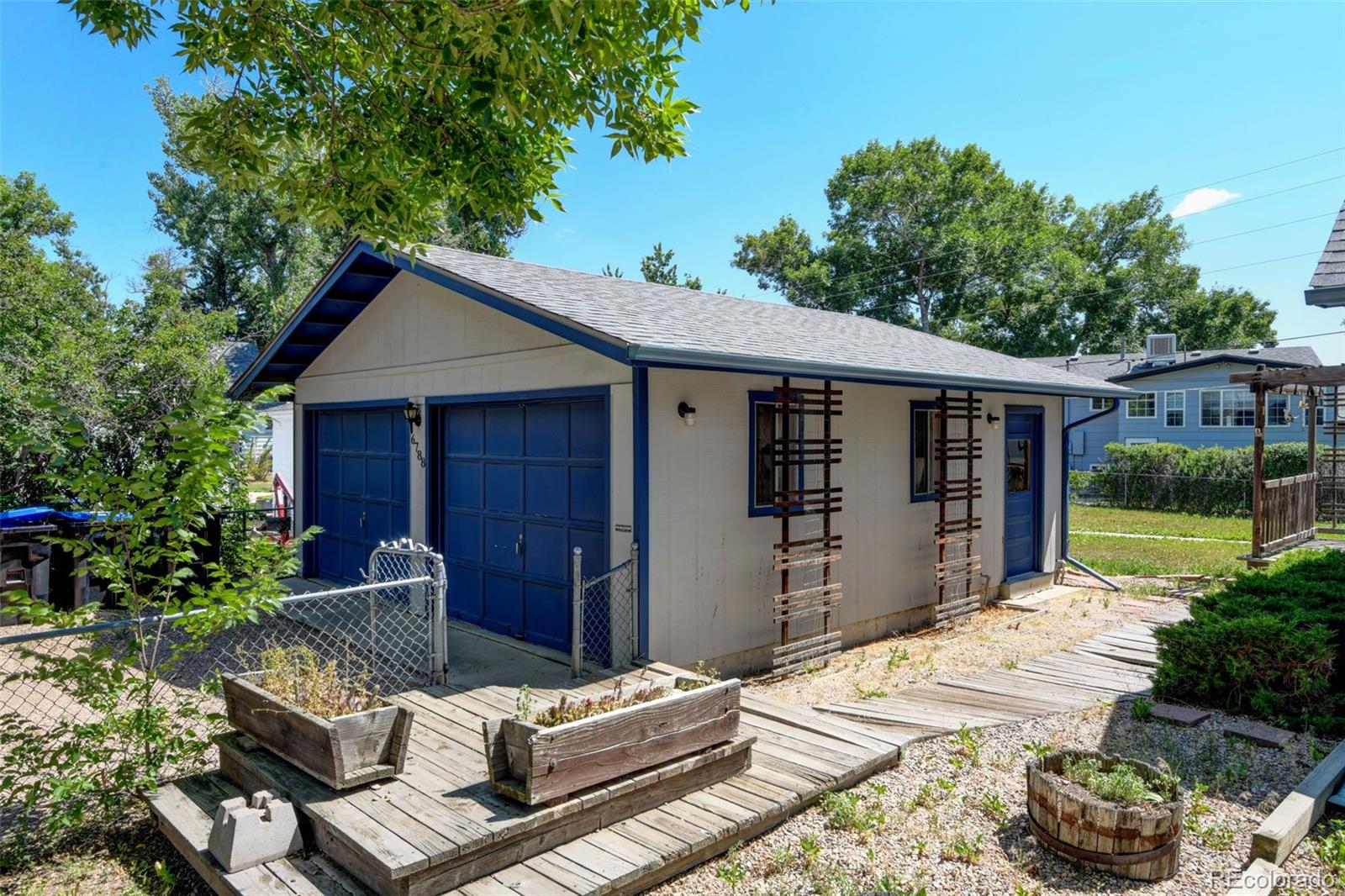 6788 Pierce Way Arvada, CO 80003 - Photo 21 of 28 a view of a house with patio