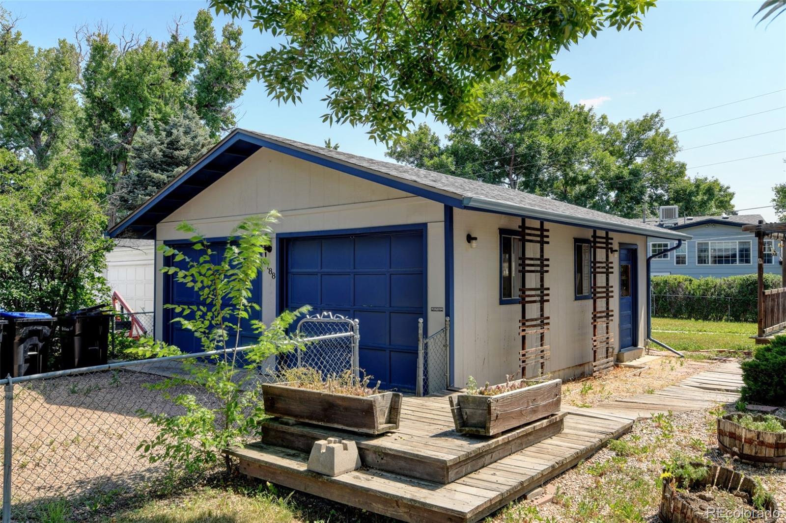 6788 Pierce Way Arvada, CO 80003 - Photo 23 of 28 a front view of house with yard