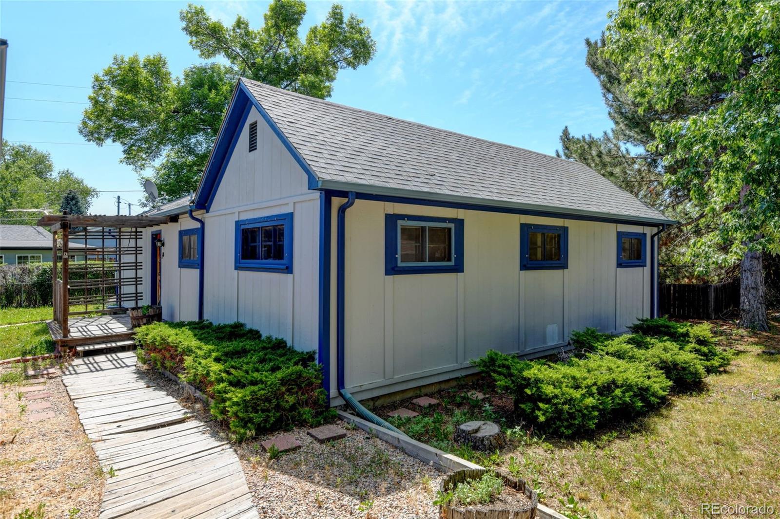 6788 Pierce Way Arvada, CO 80003 - Photo 28 of 28 a view of a back yard of the house