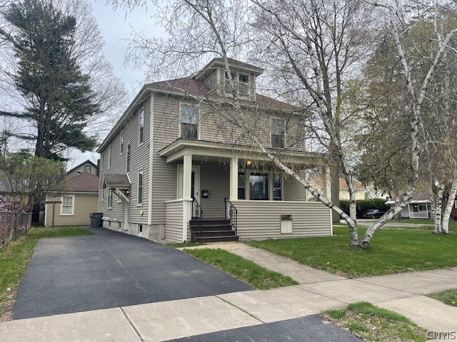 2 driveways! Vinyl siding! Young roof!