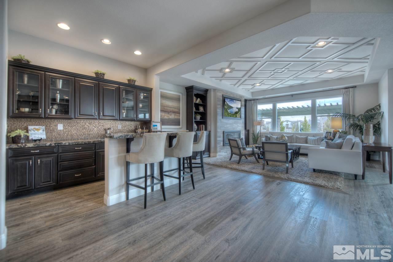 2095 Altair Lane, Unit MESSINA MODEL LOT 32 Reno, NV 89521 - Photo 11 of 25 a kitchen with stainless steel appliances granite countertop wooden floors and view living room
