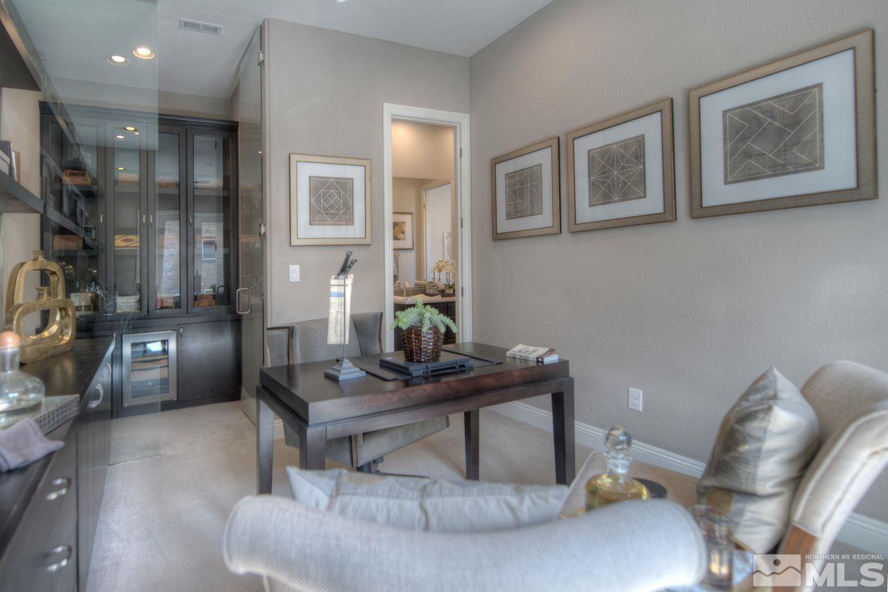 2095 Altair Lane, Unit MESSINA MODEL LOT 32 Reno, NV 89521 - Photo 21 of 25 a living room with furniture and a table