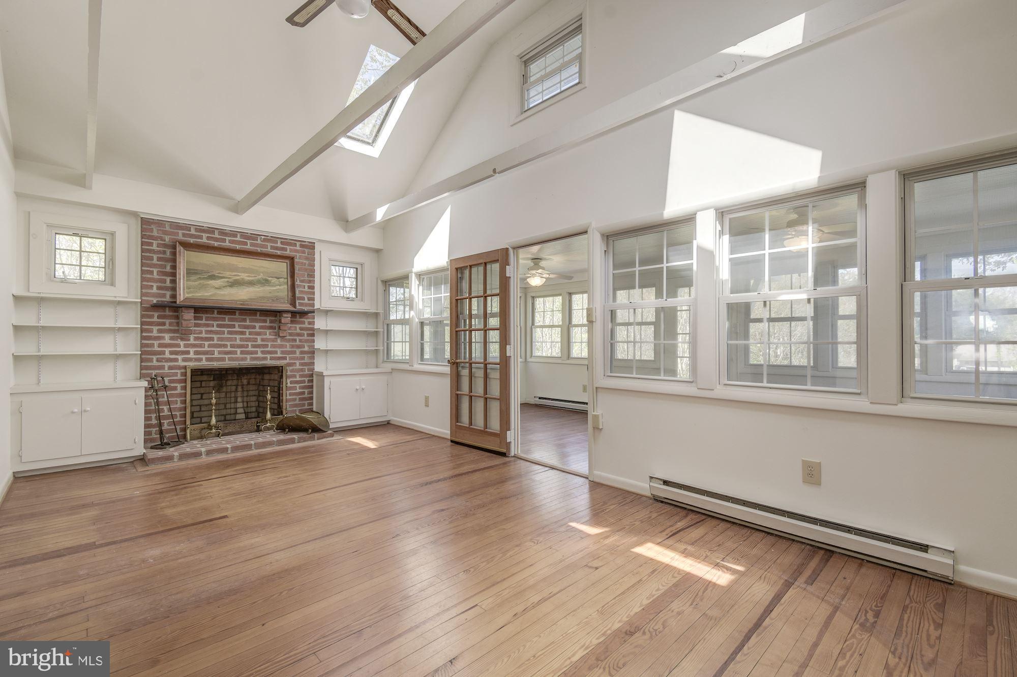 509 Arkhaven Road Tracys Landing, MD 20779 - Photo 13 of 40 Dining Area, Living Room and Sun Porch
