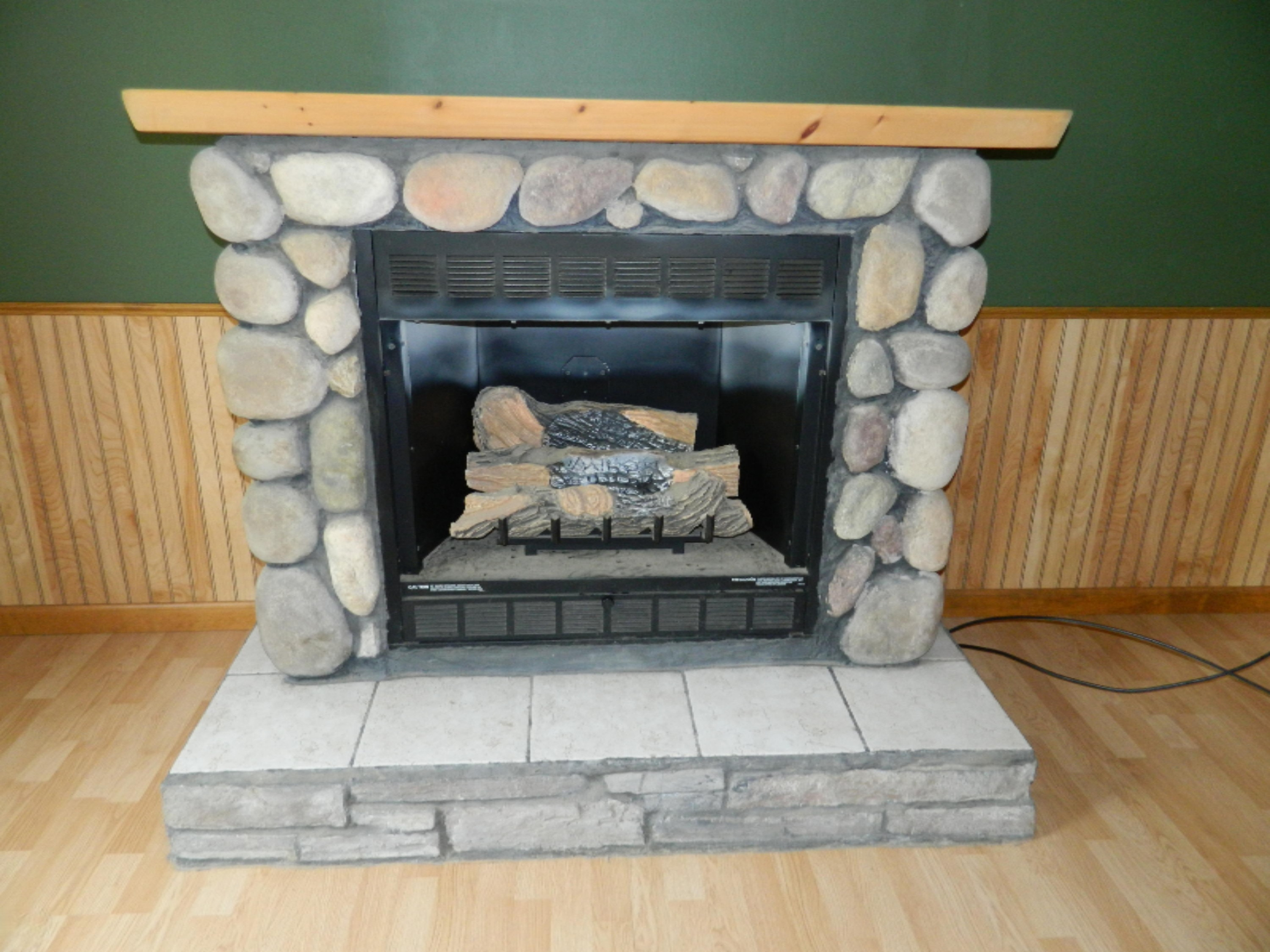 69211 Elkhart Road Edwardsburg, MI 49112 - Photo 4 of 15 Fireplace2