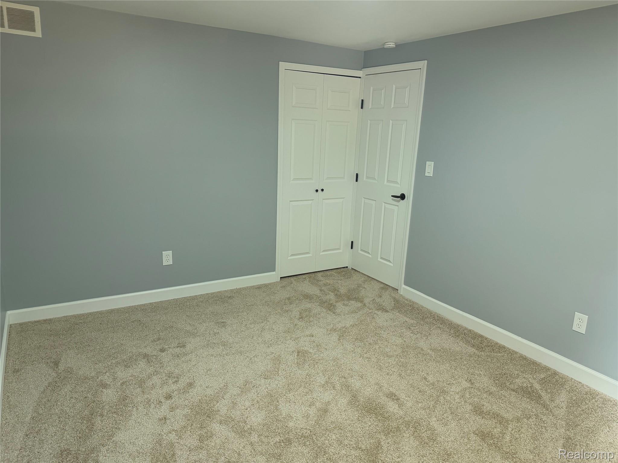 20698 Coachwood Road Riverview, MI 48193 - Photo 34 of 37 Unfurnished bedroom with carpet flooring and a closet
