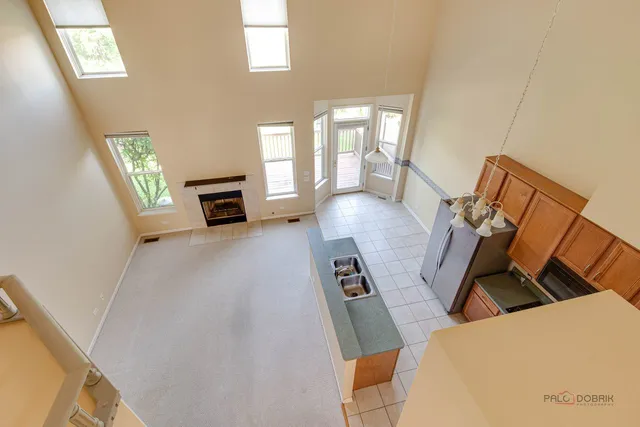 a view of a livingroom with furniture and a fireplace