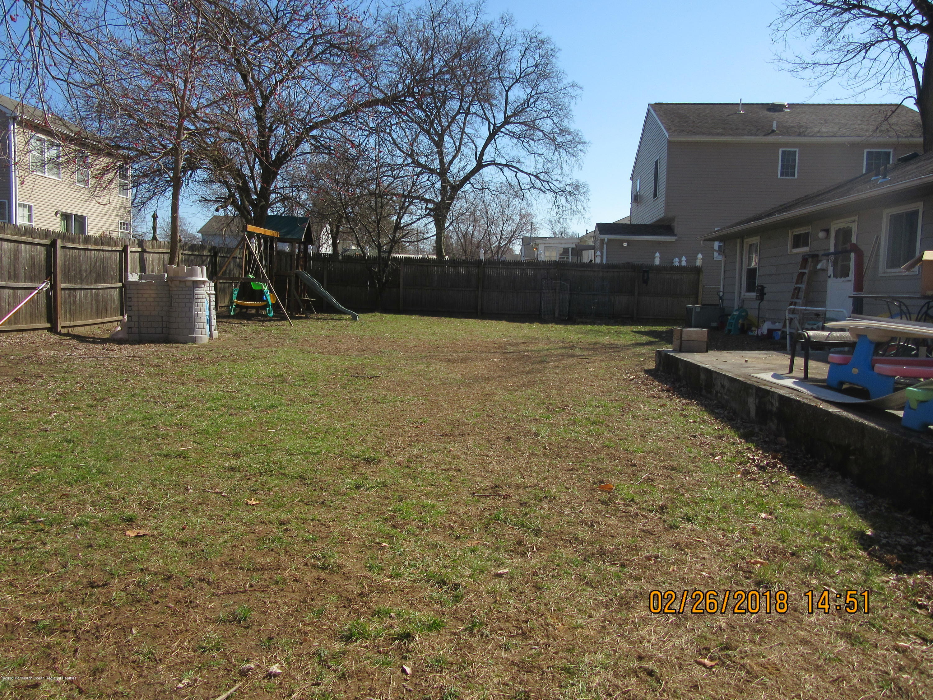 174 Raritan Street Keyport, NJ 07735 - Photo 15 of 23 a backyard of a house with lots of green space