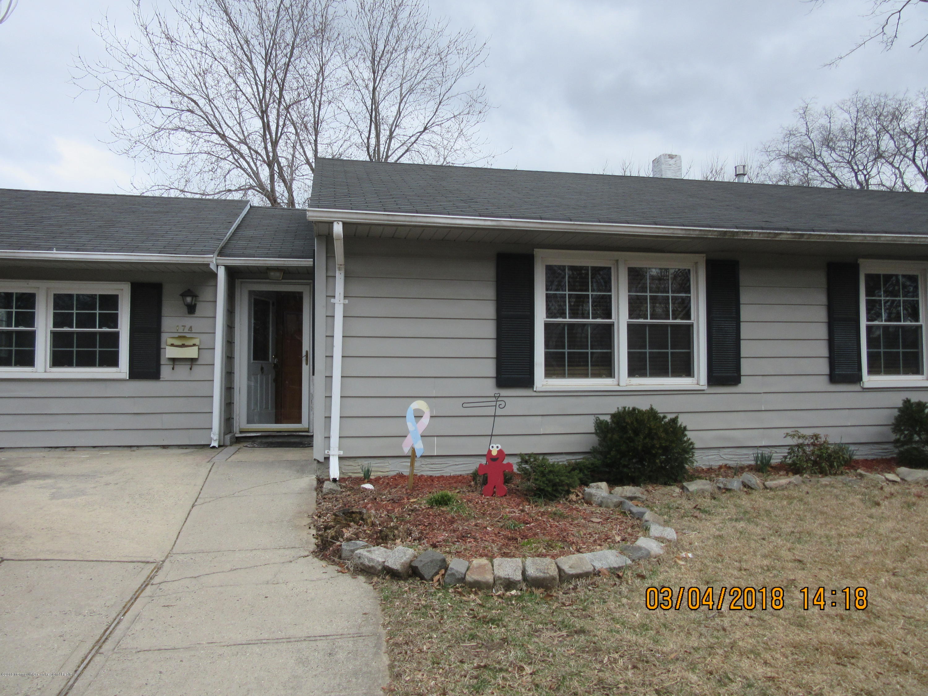174 Raritan Street Keyport, NJ 07735 - Photo 19 of 23 a front view of a house with garage