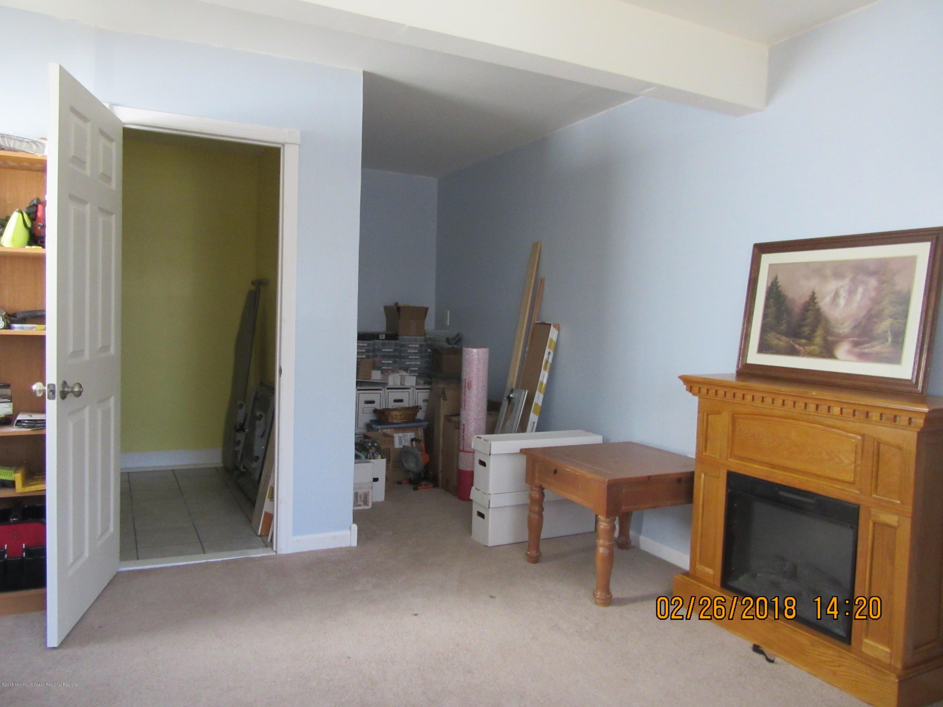 174 Raritan Street Keyport, NJ 07735 - Photo 10 of 23 a view of a livingroom with furniture and a fireplace