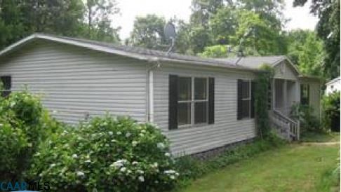 7898 Porters Road Esmont, VA 22937 - Photo 2 of 10 a view of a house with a yard