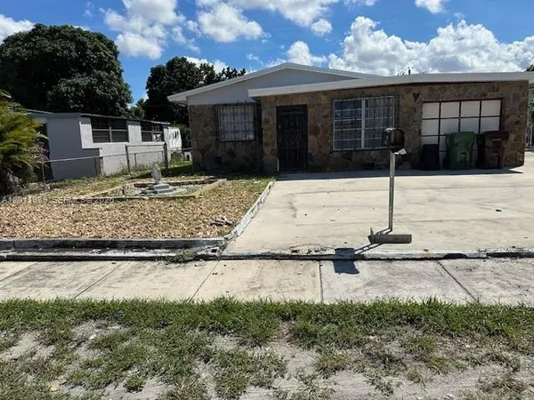 a front view of a house with porch