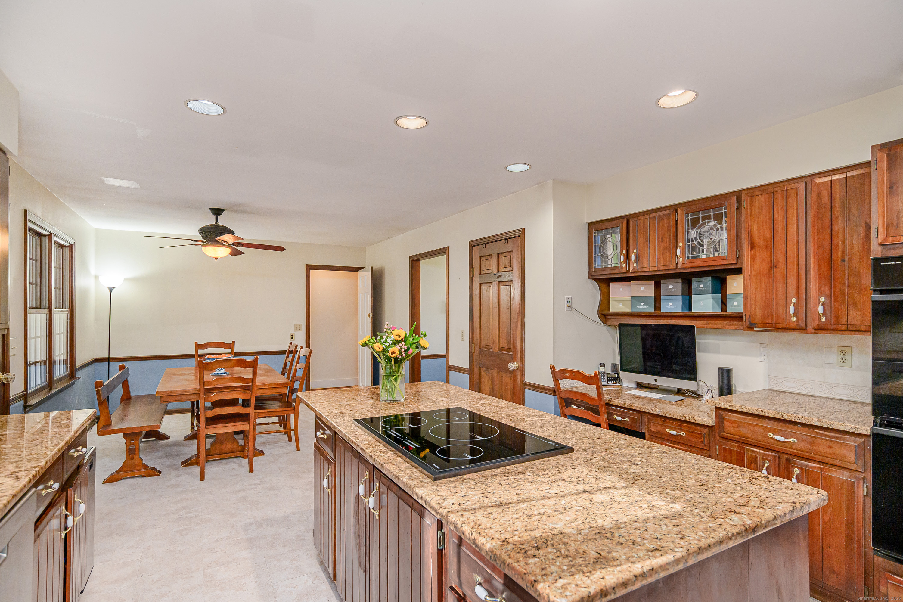 14 Concord Ridge Road Newtown, CT 06482 - Photo 11 of 40 a kitchen with sink refrigerator and stove