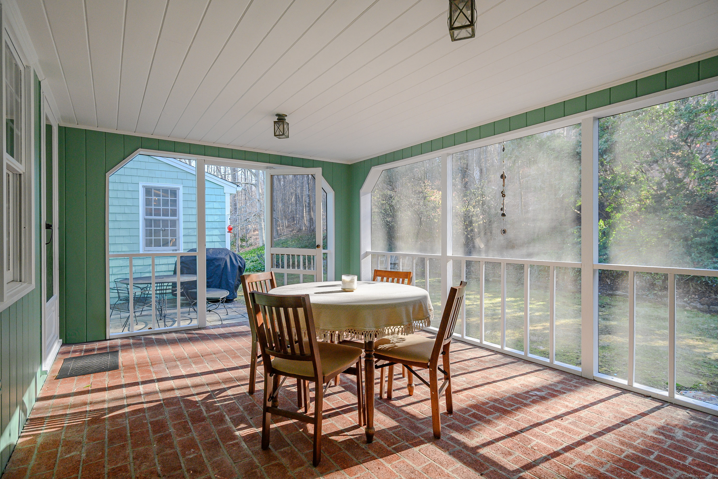 14 Concord Ridge Road Newtown, CT 06482 - Photo 12 of 40 a view of a dining room with furniture large windows and wooden floor