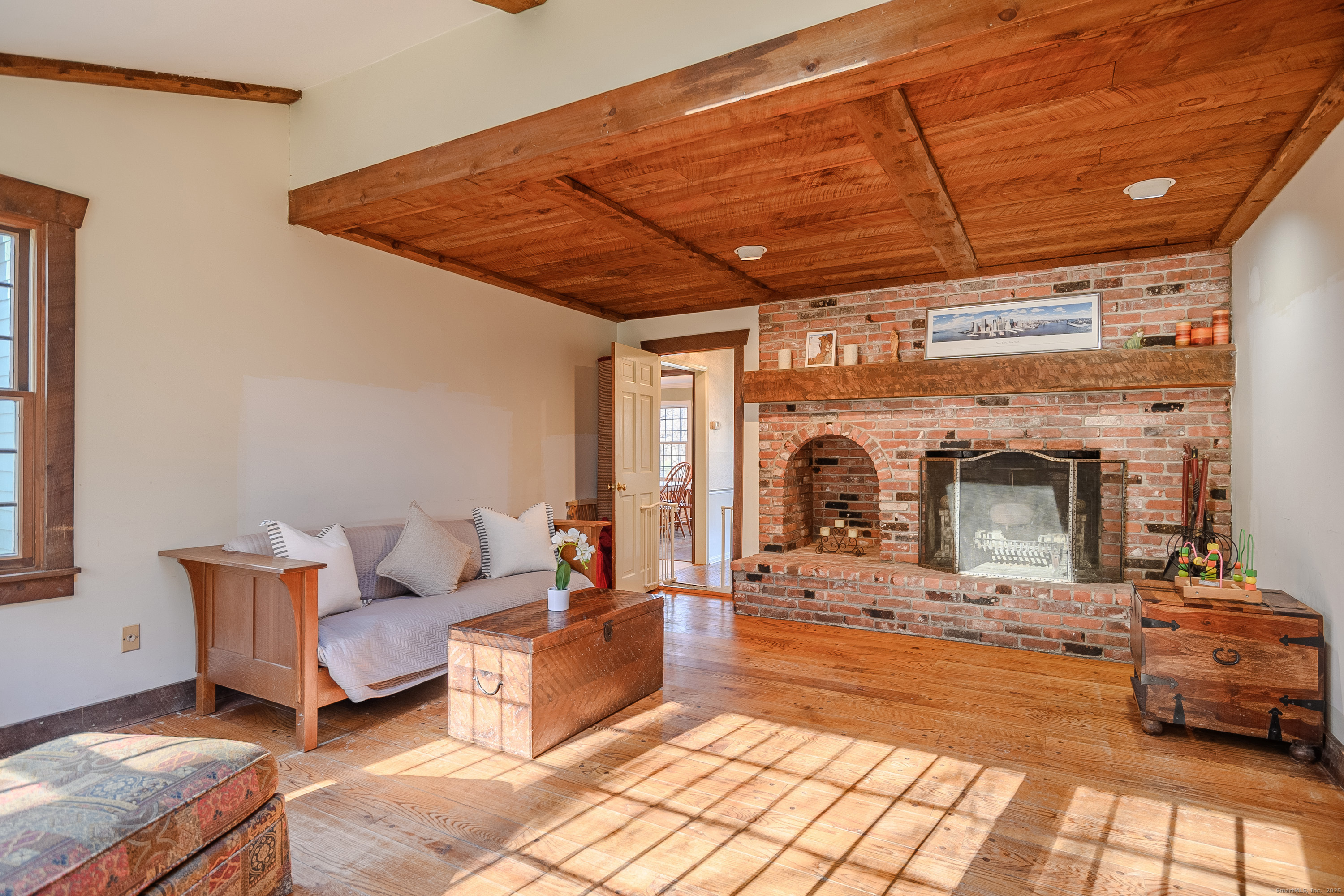 14 Concord Ridge Road Newtown, CT 06482 - Photo 14 of 40 a living room with furniture and a fireplace
