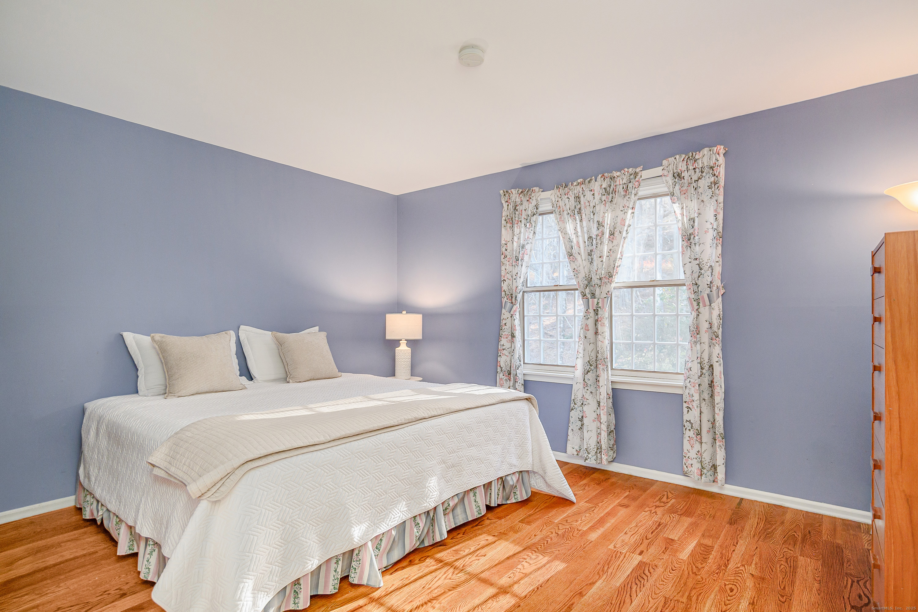 14 Concord Ridge Road Newtown, CT 06482 - Photo 19 of 40 a bedroom with a large bed and a window